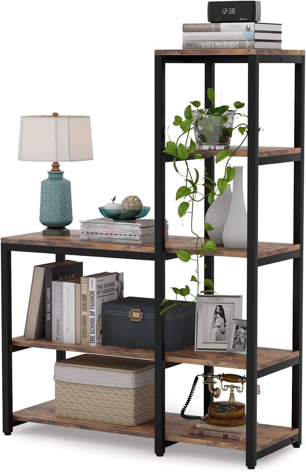 Wooden shelf with books, a lamp, and decorative items on a white background