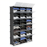 A 12-tier modular shoe rack organizer shown filled with various shoes, featuring a black frame with white slanted shoe trays and three hinged white lids on top, set against a plain white background.
