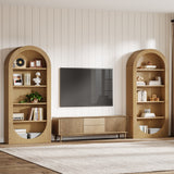 Wooden entertainment unit with shelves and a TV in a living room setting.