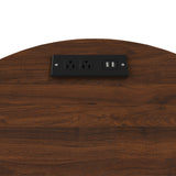 Wooden surface with a black electrical outlet and USB port.