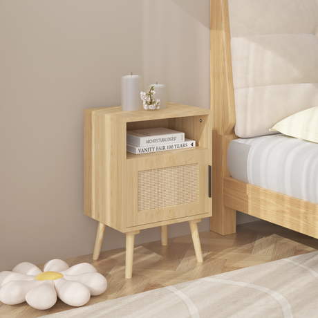 Wooden nightstand next to a bed with books and decorative items on a wooden floor.