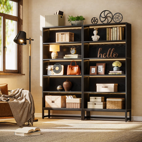 Decorative bookshelf in a living room with various items and a lamp.