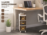 A 3-layer office desk organizer with clear plastic mesh drawers and white plastic frames, shown under a wooden desk in a home office setting. The image includes dimension markings (18cm/7in drawer width and 56cm/22in total height) and feature callouts on the left.