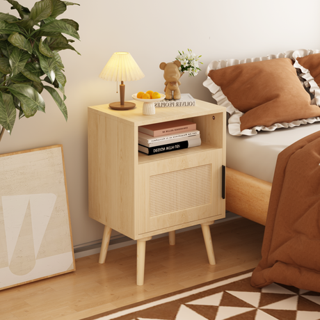 Wooden nightstand with books, lamp, and decor in a bedroom setting