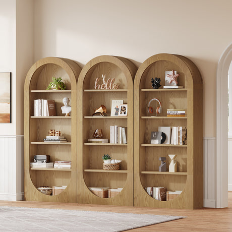 Wooden bookshelves with decorative items against a beige wall