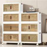 A set of six white plastic storage drawers with translucent beige-tinted doors and brown handles, shown filled with folded linens and toys in a clean indoor room setting.