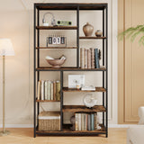 A tall black metal and rustic brown wood bookcase shelf styled with books, vases, a lamp, and decor in a warm beige room.