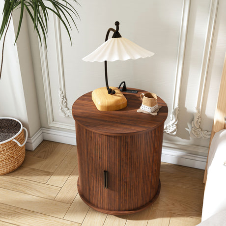 Round walnut-effect nightstand with a charging station, sliding door and open lower shelf