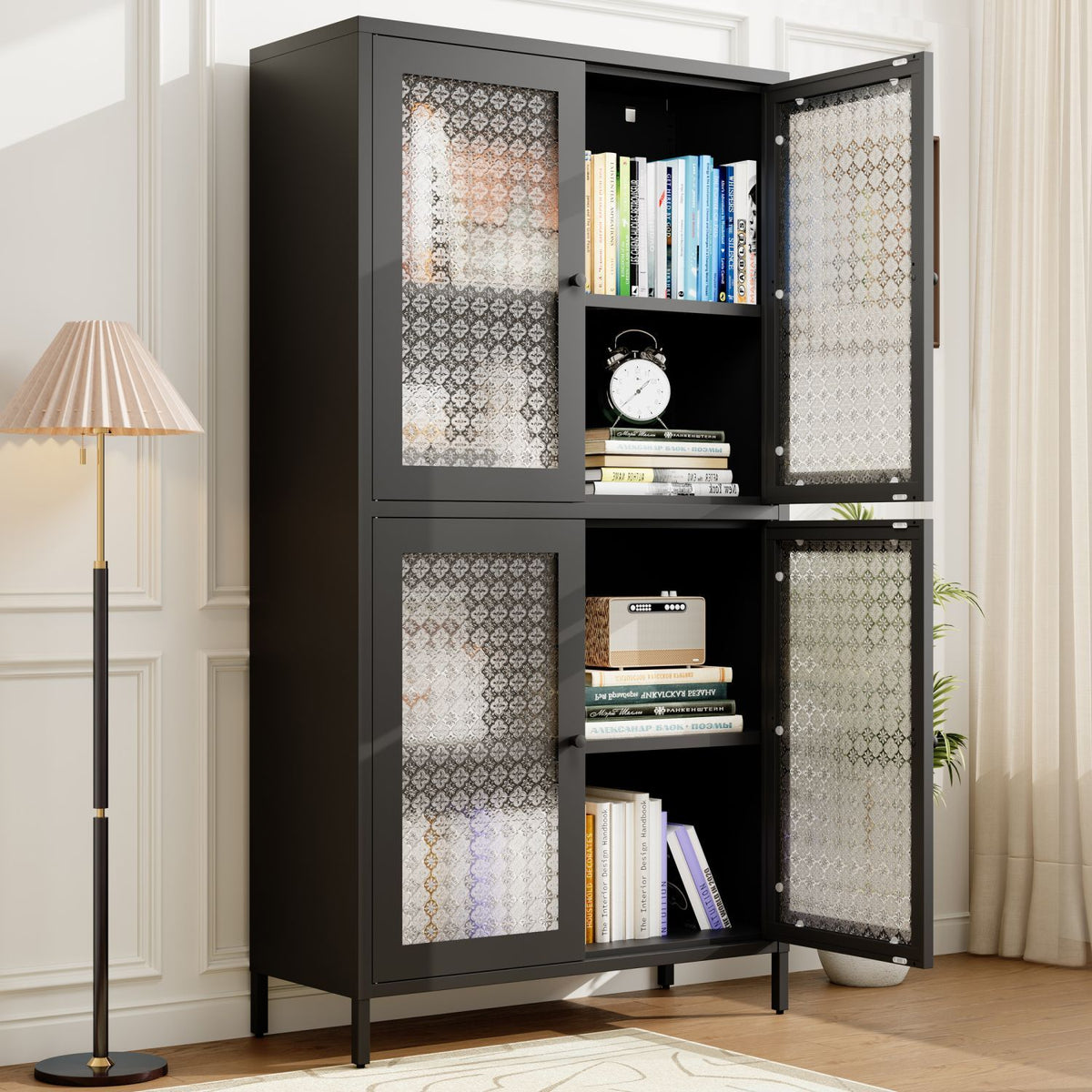 Black glass-fronted cabinet with decorative patterns in a room with a lamp and plant.