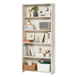 A tall, narrow white bookcase with five shelves, styled with books, vases, a plant, a small radio, a framed print, an hourglass, and storage bins, shown against a plain white background.