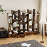 Wooden bookshelf with books and decor in a room with a lamp and plant.