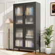 Dark gray cabinet with patterned glass doors in a room with a lamp and plant.