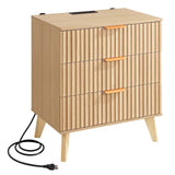 Wooden side table with three drawers and a power cord on a white background